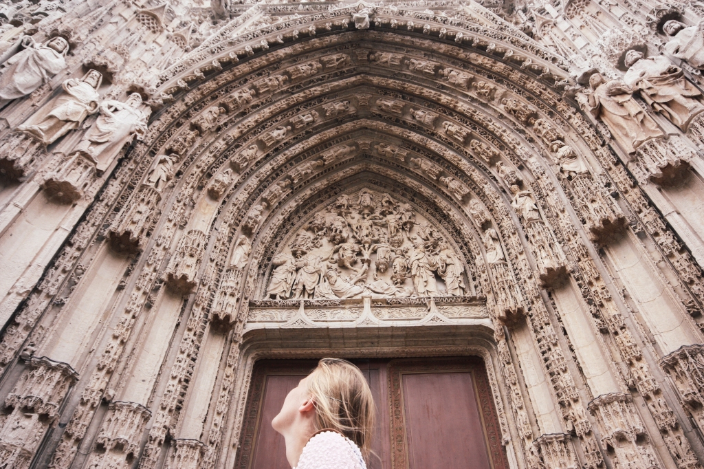 Roisin and the facade of Rouen Cathedral, France